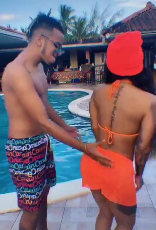 4. Beautiful Anyuri Lozano in Sexy Electric Orange Bikini Top at the Pool