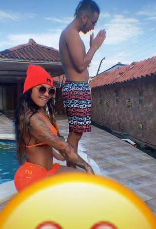 1. Sweetie Anyuri Lozano Shows Cleavage in Electric Orange Bikini Top at the Pool
