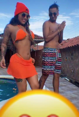 2. Sweetie Anyuri Lozano Shows Cleavage in Electric Orange Bikini Top at the Pool