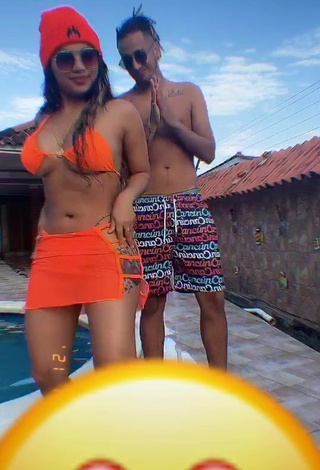 3. Sweetie Anyuri Lozano Shows Cleavage in Electric Orange Bikini Top at the Pool