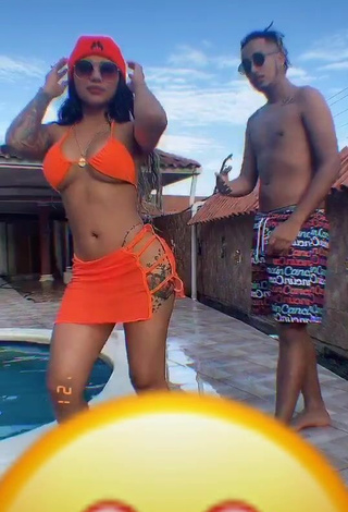 4. Sweetie Anyuri Lozano Shows Cleavage in Electric Orange Bikini Top at the Pool
