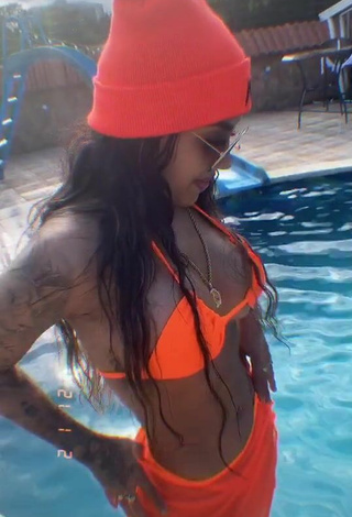Cute Anyuri Lozano Shows Cleavage in Electric Orange Bikini Top at the Pool
