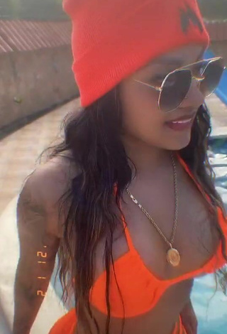 2. Cute Anyuri Lozano Shows Cleavage in Electric Orange Bikini Top at the Pool