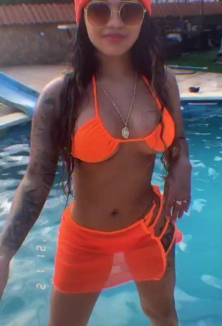 5. Cute Anyuri Lozano Shows Cleavage in Electric Orange Bikini Top at the Pool
