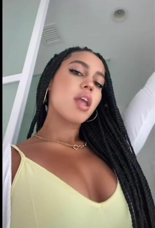 4. Beautiful Asia Monet Ray Shows Cleavage in Sexy Yellow Top