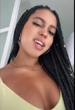 5. Beautiful Asia Monet Ray Shows Cleavage in Sexy Yellow Top