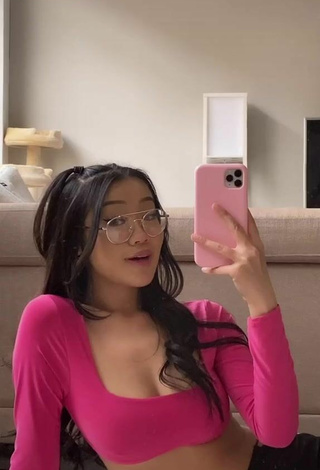 3. Sexy Char Shows Cleavage in Pink Crop Top