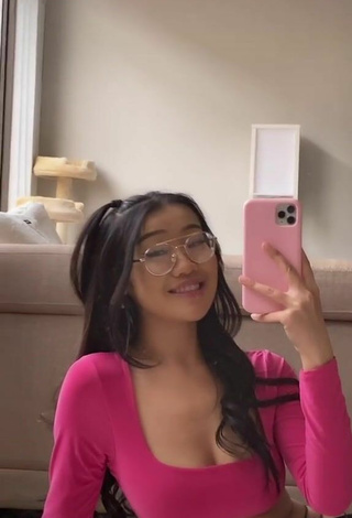 Sexy Char Shows Cleavage in Pink Crop Top