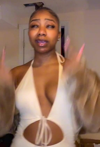 2. Hot Benita Jadah Shows Cleavage in White Dress and Bouncing Breasts