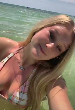 4. Sexy Caiti Mackenzie Shows Cleavage in Checkered Bikini in the Sea
