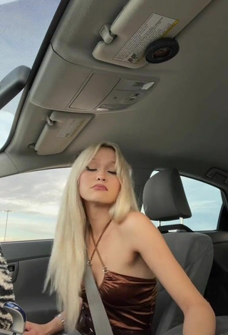 5. Sexy Isabella Sosa in Dress in a Car