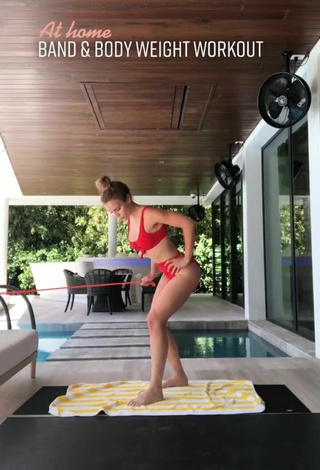 5. Sexy Elle Leonard in Red Bikini while doing Fitness Exercises