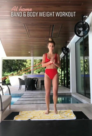 6. Sexy Elle Leonard in Red Bikini while doing Fitness Exercises