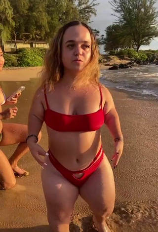 2. Alluring Emmalia Razis in Erotic Red Bikini Top at the Beach