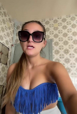Hot Eva Cstt Shows Cleavage in Blue Bikini Top