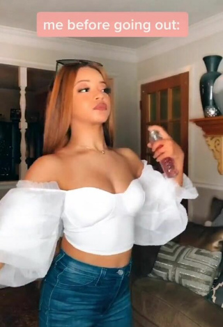 Sexy Faith Thigpen Shows Cleavage in White Crop Top