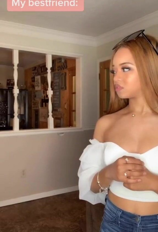 5. Sexy Faith Thigpen Shows Cleavage in White Crop Top