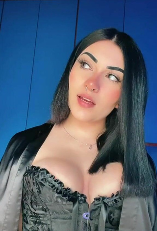 2. Sexy Gaia Macula Shows Cleavage in Black Corset
