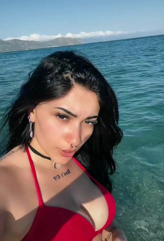 2. Sexy Gaia Macula Shows Cleavage in Red Bikini Top in the Sea