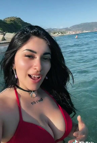 3. Sexy Gaia Macula Shows Cleavage in Red Bikini Top in the Sea