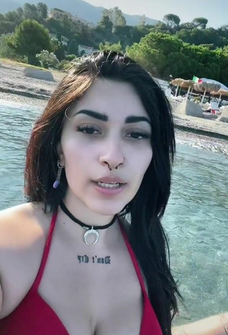 4. Sexy Gaia Macula Shows Cleavage in Red Bikini Top in the Sea