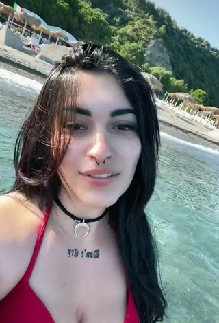 5. Sexy Gaia Macula Shows Cleavage in Red Bikini Top in the Sea