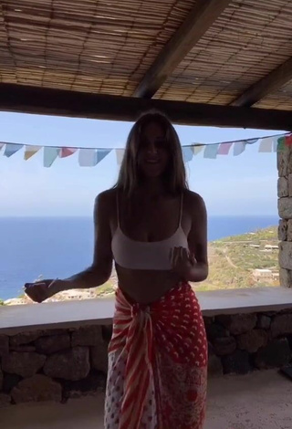 6. Sexy Gaia in White Crop Top on the Balcony
