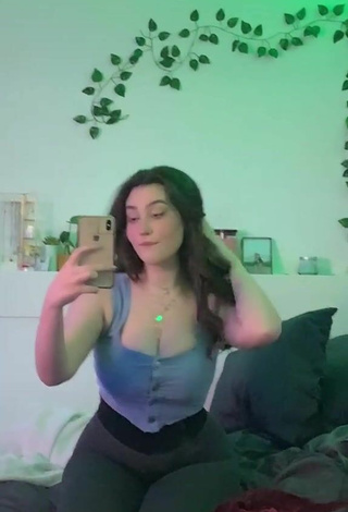 6. Simone Shows Cleavage in Sexy Grey Crop Top
