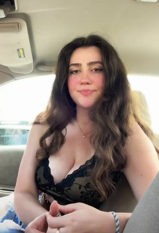 2. Simone Demonstrates Breathtaking Cleavage in a Car