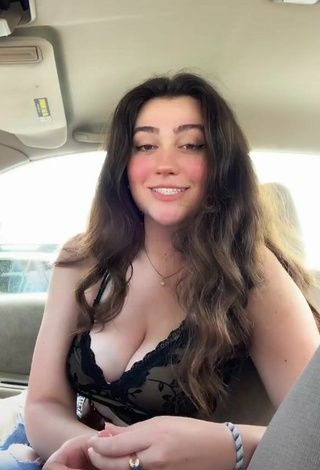 4. Simone Demonstrates Breathtaking Cleavage in a Car