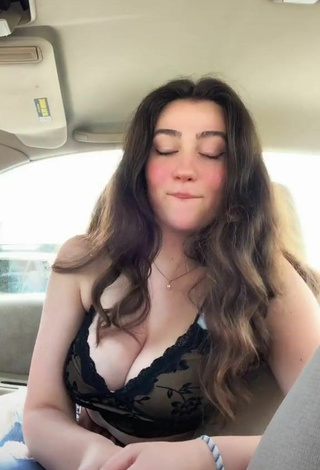 6. Simone Demonstrates Breathtaking Cleavage in a Car