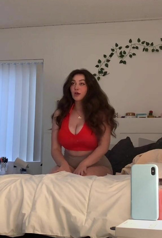 Adorable Simone Shows Cleavage in Seductive Red Crop Top