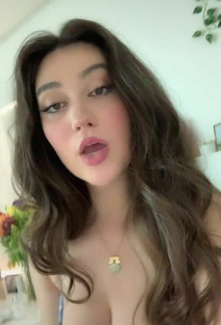 2. Sexy Simone Shows Cleavage in Floral Dress