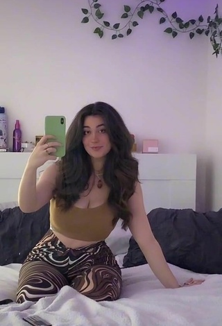 6. Beautiful Simone Shows Cleavage in Sexy Olive Crop Top