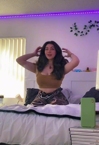 3. Cute Simone Shows Cleavage in Olive Crop Top
