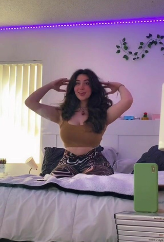 4. Cute Simone Shows Cleavage in Olive Crop Top