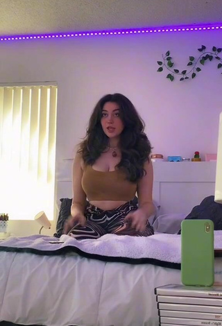 5. Cute Simone Shows Cleavage in Olive Crop Top