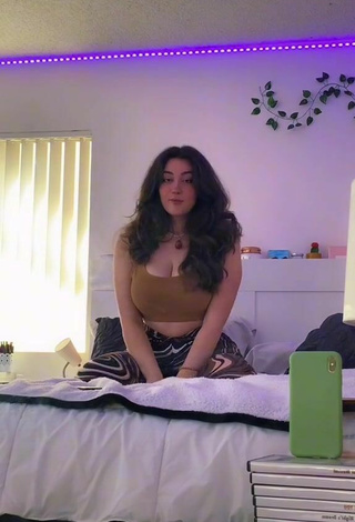 6. Cute Simone Shows Cleavage in Olive Crop Top