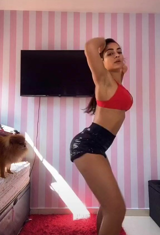3. Seductive Ingrid Muniz Shows Cleavage in Red Bikini Top while Twerking