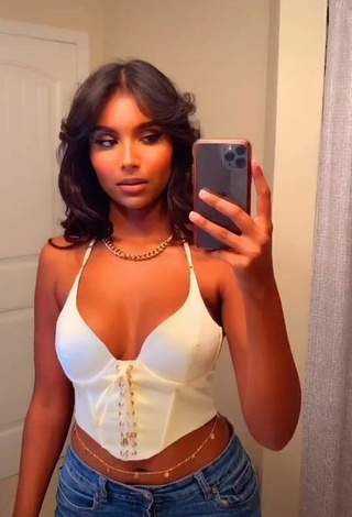 Sweetie Ishini W Shows Cleavage in White Crop Top