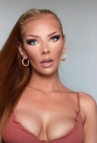 Sexy Jessy Volk Shows Cleavage in Brown Bikini Top