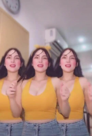 4. Cute Karen Anne Tuazon Shows Cleavage in Yellow Crop Top