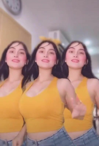 5. Cute Karen Anne Tuazon Shows Cleavage in Yellow Crop Top