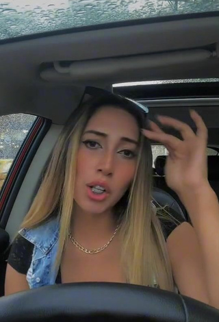 6. Beautiful Karen Ramos Shows Cleavage in a Car