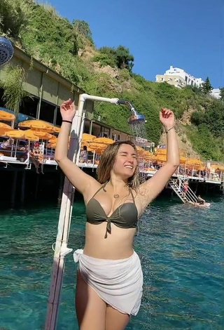 2. Sexy krtlkumsal Shows Cleavage in Olive Bikini Top in the Sea