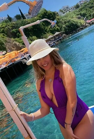 2. Sexy krtlkumsal Shows Cleavage in Violet Swimsuit