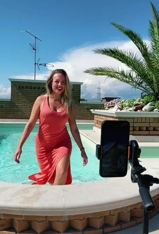 2. Sexy lalequita in Red Dress at the Swimming Pool