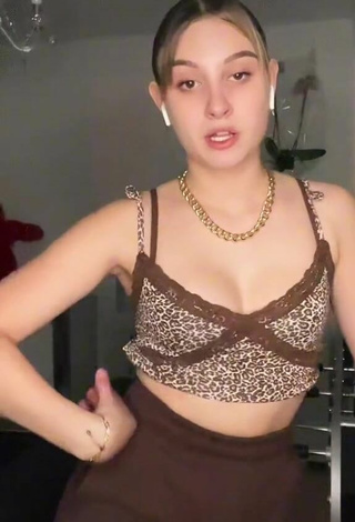 4. Sexy Loane Shows Cleavage in Leopard Crop Top