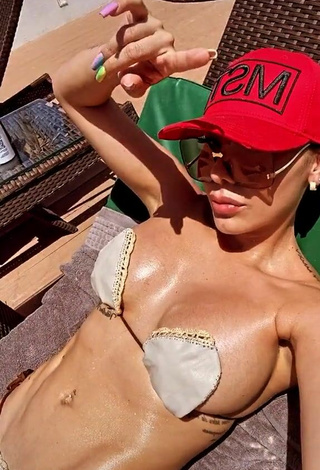 3. Sexy Marcela Reyes Shows Cleavage in Beige Bikini