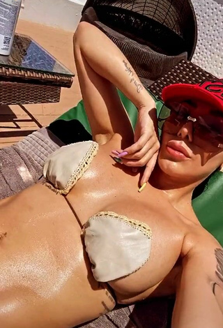 6. Sexy Marcela Reyes Shows Cleavage in Beige Bikini